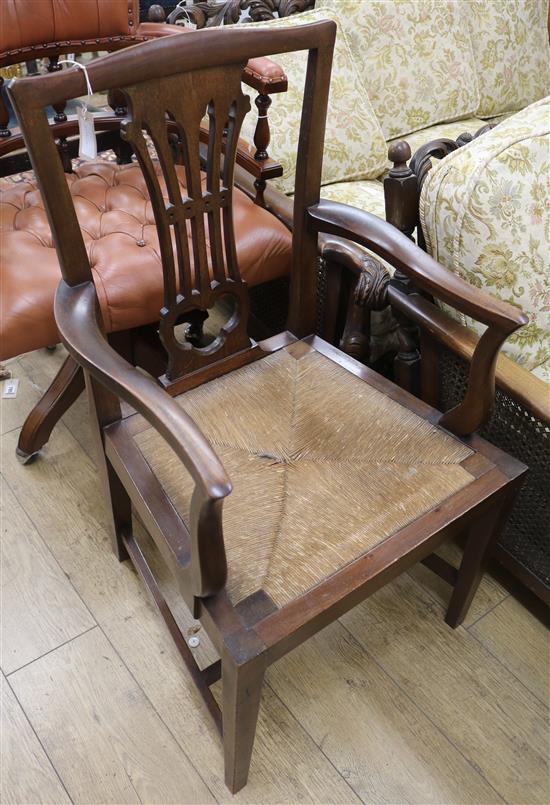 A 19th century Chippendale style elbow chair